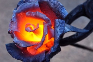 heated metal rose glowing in the center