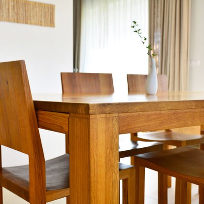 How To Remove Adhesive Residue From Wood Doityourself A Wood Table And Chairs