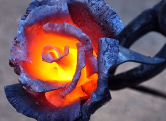heated metal rose glowing in the center
