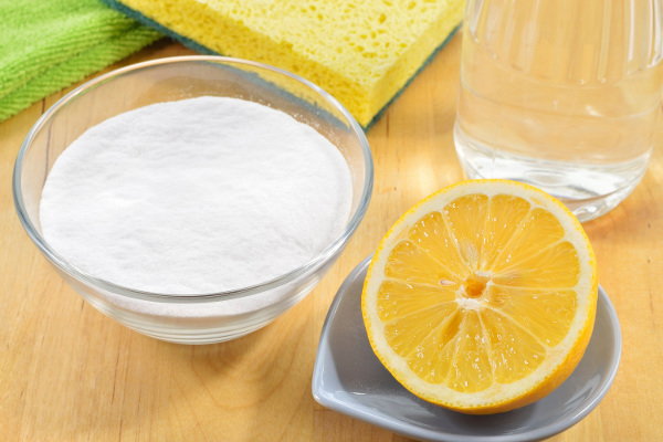 Half a lemon and other cleaning materials