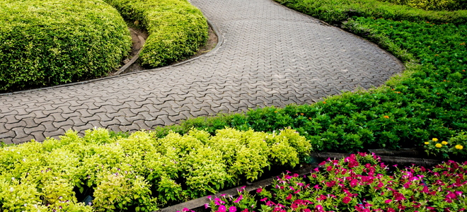 Formal landscaping with curved stone pathway
