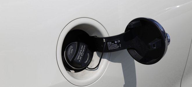 Fuel cap on white car