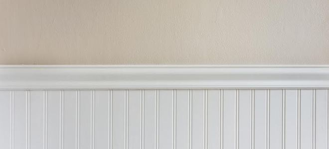 White beadboard below beige wall