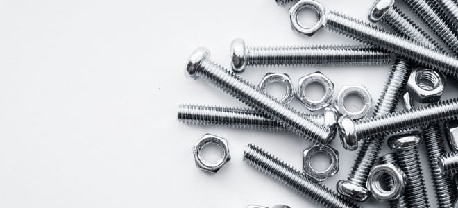 A pile of metal screws and nuts