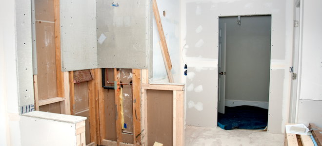 Construction in partially sheetrocked room