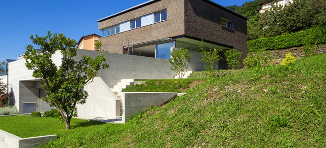 A modern house on a hill. 