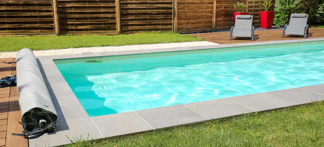 An inground pool cover.