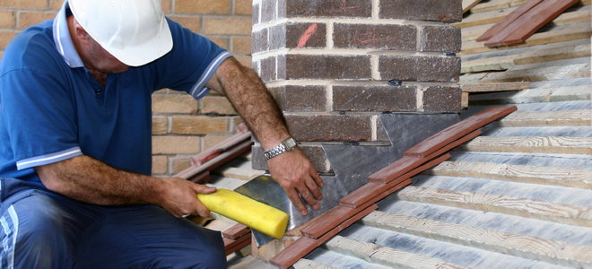 How To Install A Chimney Roof Flashing Doityourself Com - How To Flash A Roof Against Brick Wall