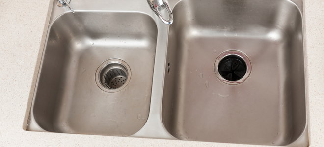 A garbage disposal in a sink.