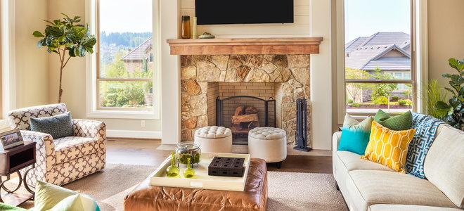 Living room with fireplace and wall mounted TV