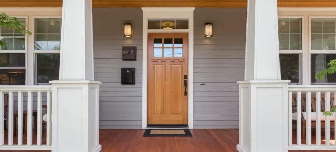 entranceway door with wood frame on porch