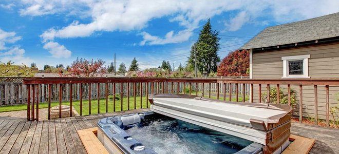 Hot tub with cover folded back