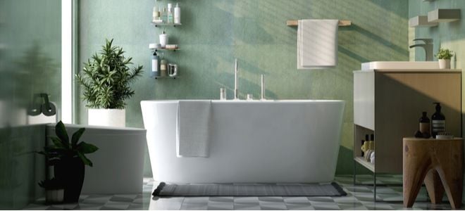 large bathtub in green bathroom