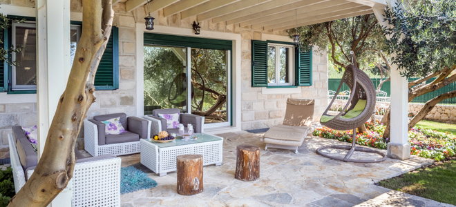 stone patio with furniture