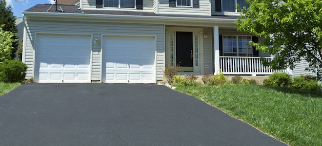 home with asphalt driveway