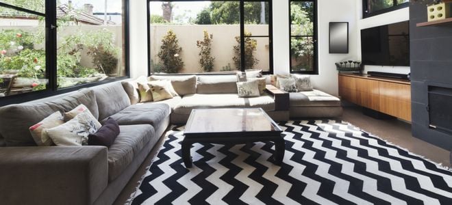 entertainment room with black and white zig zag rug
