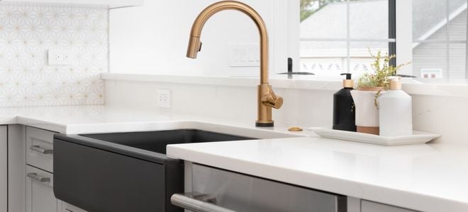 basin farmhouse sink with brass faucet