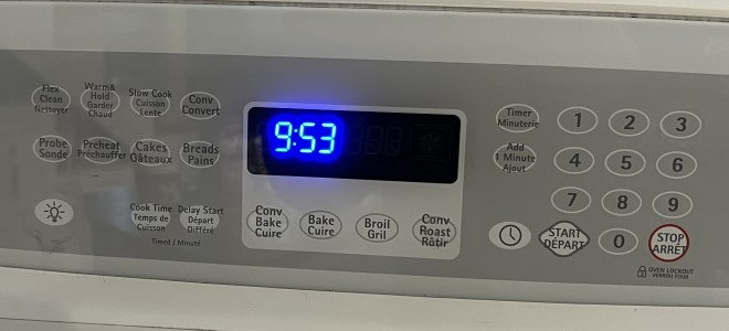oven control panel with just clock displaying