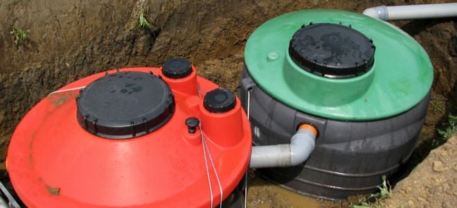 two large septic tanks in trench