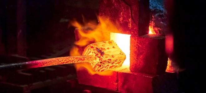 forging a hot piece of metal