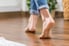 bare feet on hardwood floors