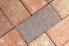 Looking closely at a normal formation of laid brick pavers.