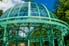 rusting metal gazebo with curved shapes