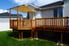 Deck with railing and canvas cover