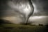 tornado spinning above field