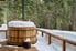 hot tub covered in winter snow