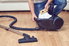 removing the bag from a canister vacuum cleaner