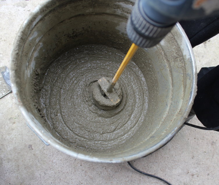 How to Fill a Cinder Block with Concrete | DoItYourself.com