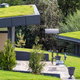 green houses with sod grass roofing