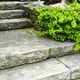 large stone landscaping steps with shrubbery