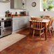 kitchen with terracotta tile floor
