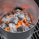 grill with coals lit in chimney starter