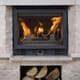 fireplace with beige brick hearth