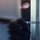 A burglar opening a locked door