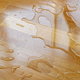 A water spill on wood flooring.