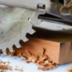 a circular saw resting on a piece of lumber