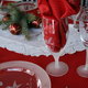 Holiday table setting with etched glassware.
