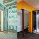 A side-by-side comparison of a bathroom under construction and the finished product.