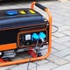 a black and orange generator