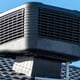 an evaporative cooler system on a roof