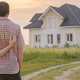 couple looking at country home