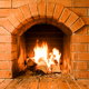 fire in a clean brick fireplace
