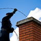 Man cleaning a chimney