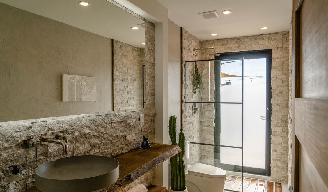 Elegant stone bathroom at 636 Valencia Drive in Joshua Tree.