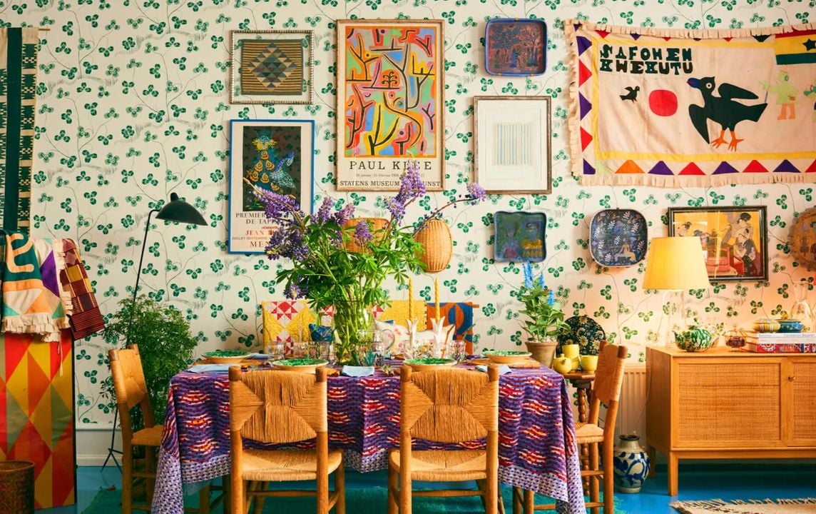 Adorable maximalist dining space proudly celebrates the art of cluttercore.