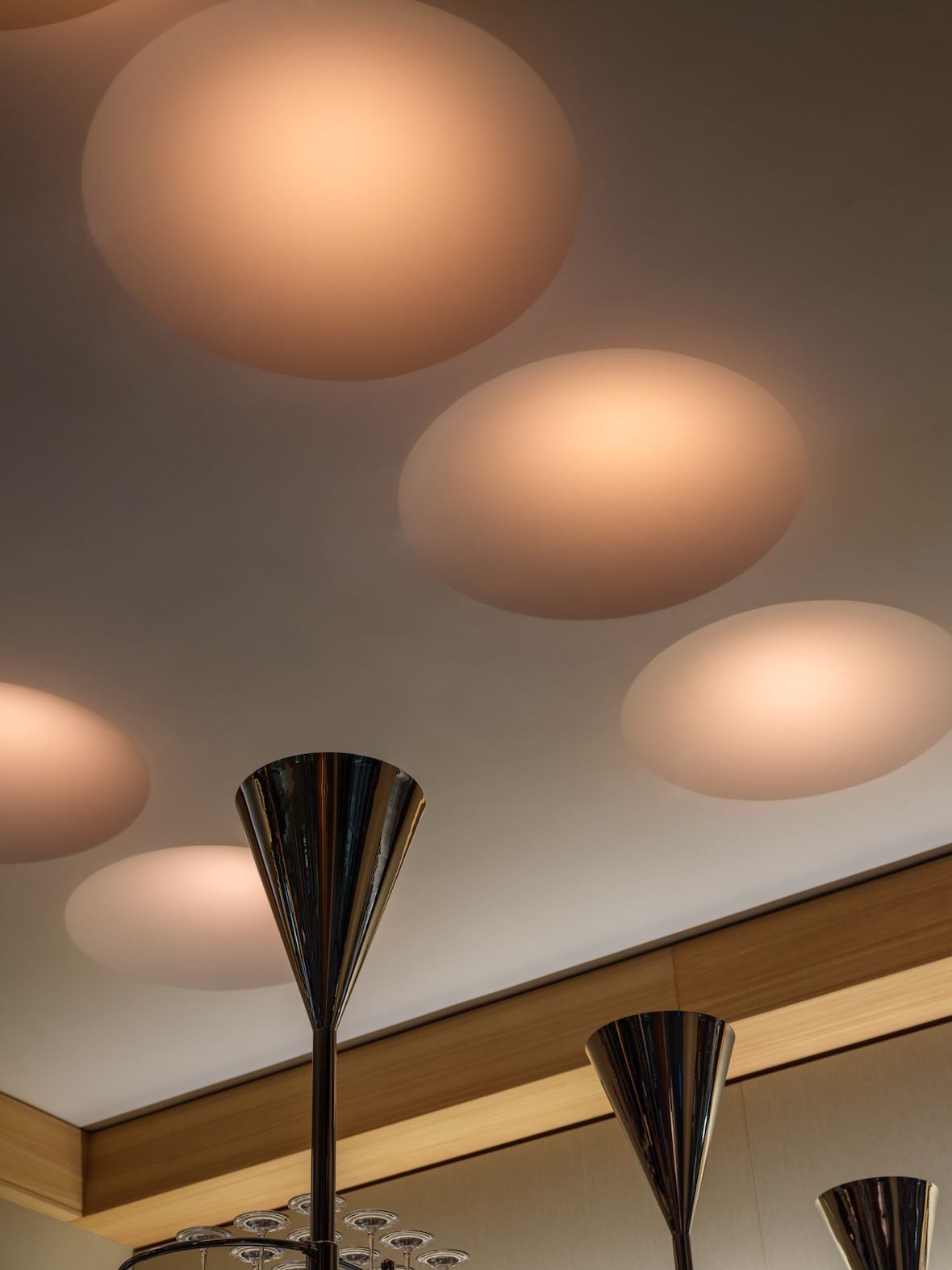 Warm built-in ceiling lights inside Copenhagen's new Restaurant Levi.